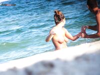 The feeling of the warm sand and the sun on a bare, sun-kissed figure. 2