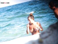 The feeling of the warm sand and the sun on a bare, sun-kissed figure. 2
