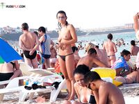 The sensation of the salt air and sun on a bare, topless figure. 2