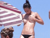 The sensation of the glowing sun on every inch of skin at a private naturist beach.