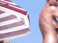 The sensation of the glowing sun on every inch of skin at a private naturist beach.