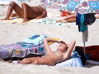 A candid look at the naturist culture at a beautiful local beach. 2