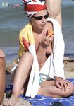 A quiet afternoon on the sand, focused on the peace of being topless.