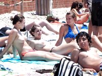 Here are a couple of gorgeous women taking a shower outdoors at a naturist resort. 2
