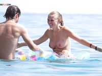 She Walks From the Shallows at a Pebble Nude Beach