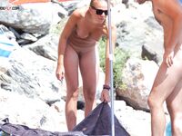 She Walks From the Shallows at a Pebble Nude Beach