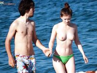A lady relaxing on a wooden pier in a state of total freedom and nudity. 2