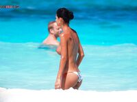 The feeling of the warm sand and the sun on a bare, sun-kissed body. 2