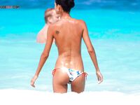 The feeling of the warm sand and the sun on a bare, sun-kissed body. 2