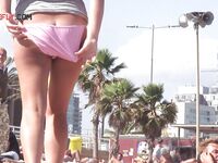 Just a very warm day at the strand! Emma had to get it all off to stay cool!.