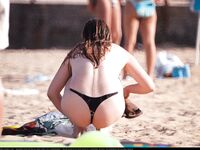 The best place to show your tattoo. On the nude beach. Look at these tattoos!.