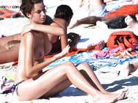 An artistic study of the human form at a beach that celebrates the naturist spirit.