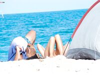 Embracing the elements: salt air, warm light, and the liberty of being topless. 2