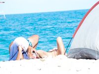 Embracing the elements: salt air, warm light, and the liberty of being topless. 2