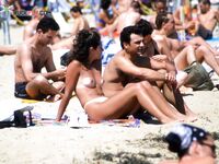 The sensation of the glowing sun on every inch of skin at a private naturist location.