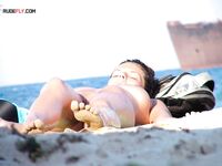 The feeling of liberation that comes with being nude in nature.