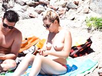 One Woman with Pink Hair on a Topless Beach