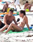The simple pleasure of a long, topless walk along the edge of the turquoise sea.