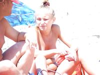 Soft sand and golden skin: a peaceful morning spent in a classic topless fashion. 2