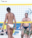 The feeling of the warm sand and the sun on a bare, sun-kissed figure. 3