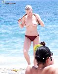 A sun-worshipper finding her piece of heaven at a clothing-optional shore.