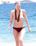 A sun-worshipper finding her piece of heaven at a clothing-optional shore.