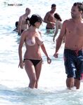 A sun-worshipper finding her piece of heaven at a clothing-optional shore.