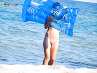 . The joy of a topless afternoon spent relaxing by the vast ocean. 3