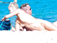 The liberating touch of the warm sand on a completely bare body. 2