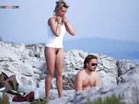. A study of light, shadows, and bare skin at a beautiful, clothing-optional shore.