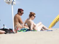 Another day at the nude beach. More and more nude woman passing by. What a beautiful day!.
