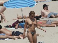 Fully Nude Face-Down Sunbathing on an Elephant-Print Towel