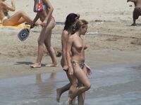 Fully Nude Face-Down Sunbathing on an Elephant-Print Towel
