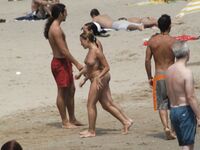 Fully Nude Face-Down Sunbathing on an Elephant-Print Towel