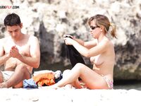 A day at the beach with no tan lines in sight, just pure sun and freedom. 2