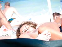 The ultimate sense of liberty: spending the entire day at the beach in a topless fashion.