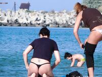 A series of artistic frames showing the beauty of a life without tan lines. 3