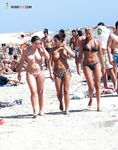The freedom of a long midday walk on a beach where clothes are not required. 2