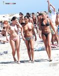 The freedom of a long midday walk on a beach where clothes are not required. 2