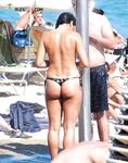 Walking Out of Turquoise Shallows at a Nude Beach
