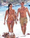 Walking Out of Turquoise Shallows at a Nude Beach