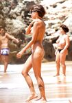 Aussie strand babe, with her topless mother in a couple of the shots.