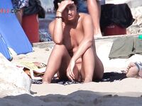 Tan Lines and Clipped Hair at the Nude Beach Shoreline