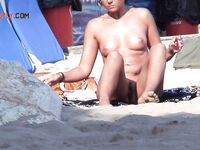 Tan Lines and Clipped Hair at the Nude Beach Shoreline