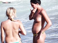 Just Back From a Swim With Wet Dark Hair on the Sand