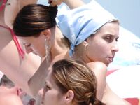 A woman enjoying the vastness of the open sea in a free and natural way. 4