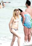 Embracing the natural human form at a stunning, clothing-optional bay. 6