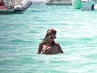 Capturing the authentic spirit of freedom at a local clothing-optional beach. 3
