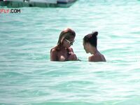 Capturing the authentic spirit of freedom at a local clothing-optional beach. 3