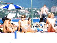 The soft texture of the sand and the warmth of a sun-drenched, bare body. 3